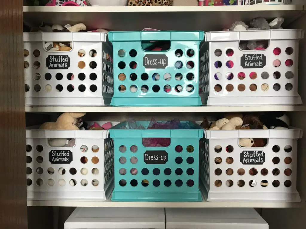 organized totes on shelf in closet