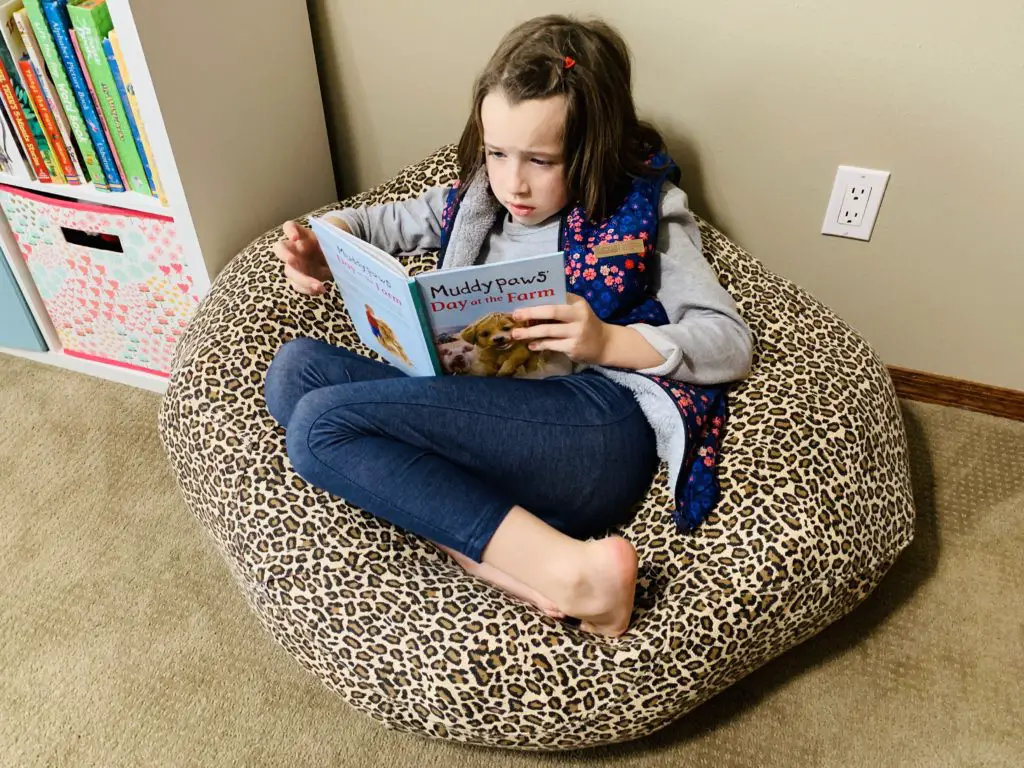 child using stuff animal bean bag